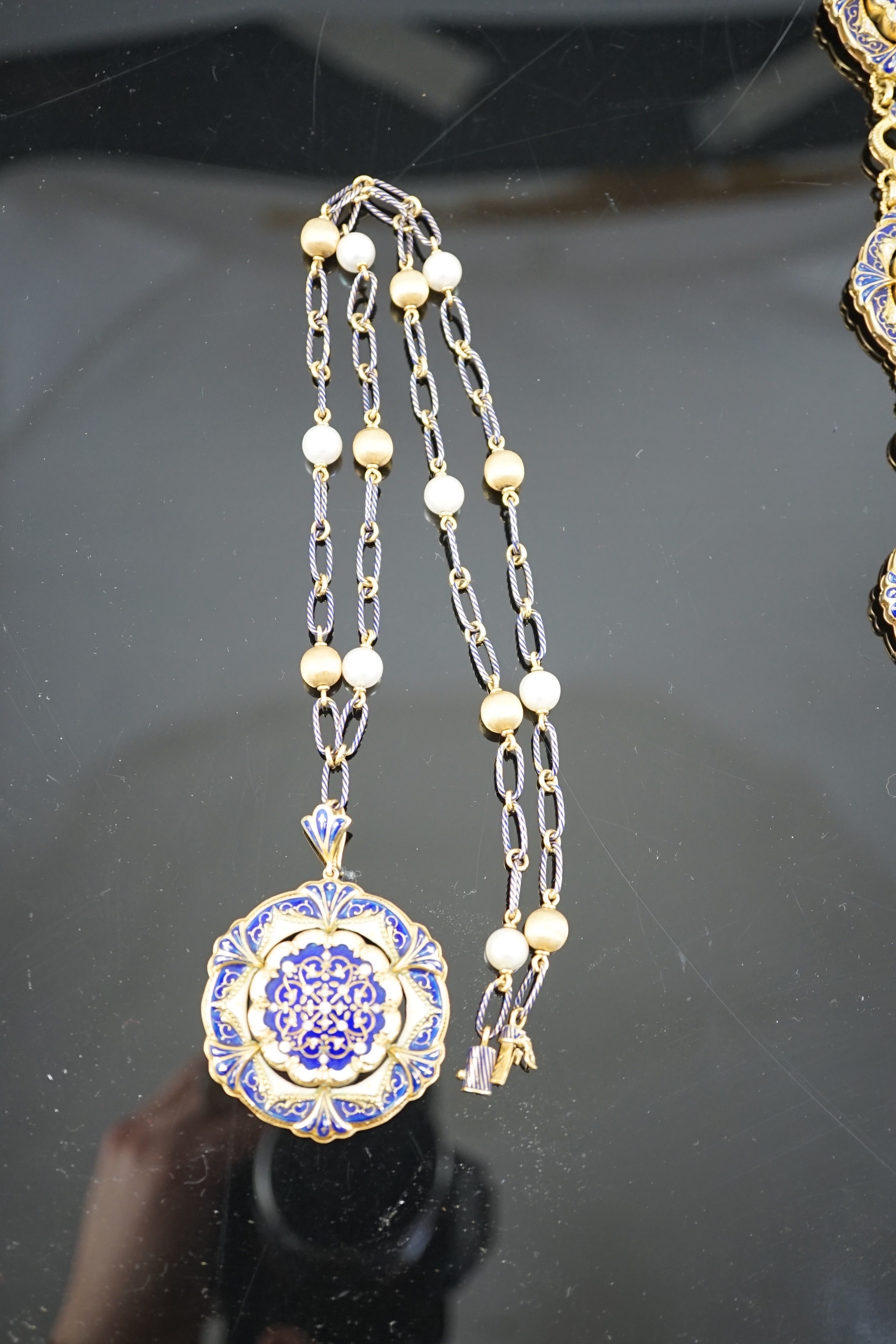 A late 19th century Swiss 18ct gold and polychrome enamelled suite of jewellery, retailed by E. Meister, Zurich